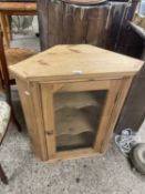 Modern pine corner cabinet with glazed front