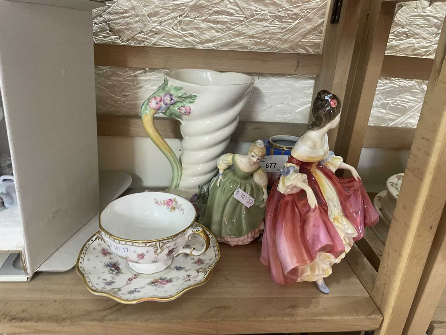 A Royal Doulton figure of Southern Belle HN2229 together with a Royal Doulton of Fair Maiden