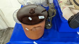 A stoneware breadbin together with a Spelter figure