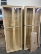 Pair of light wood corner display cabinets