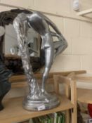 Silvered finish composition of a nude lady