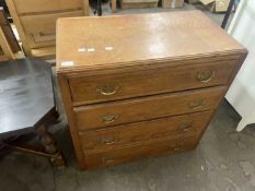 An oak four drawer chest