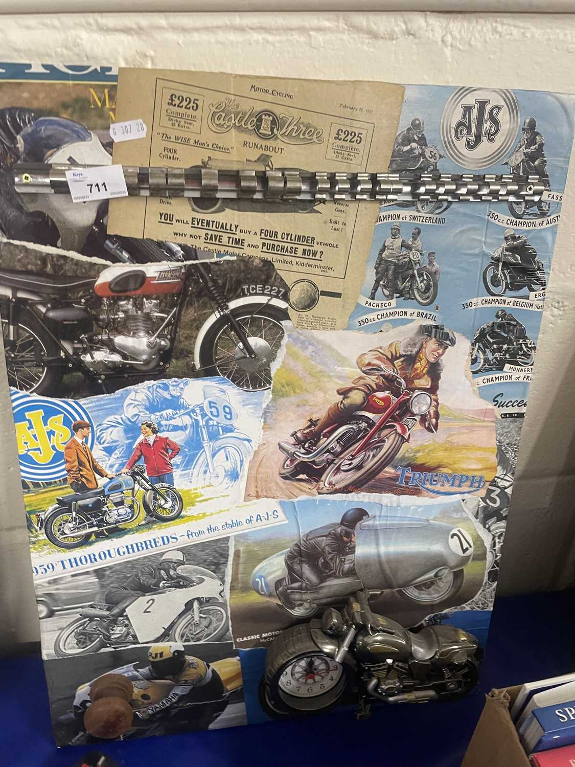 Motorcycle clock on a montage backing