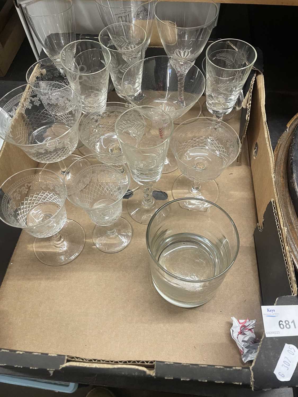 A box of mixed drinking glasses