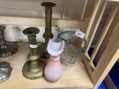 A pair of brass candlesticks, brass table basket and a Burmese style glass vase (4)