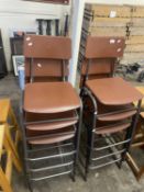 Six metal framed stacking chairs