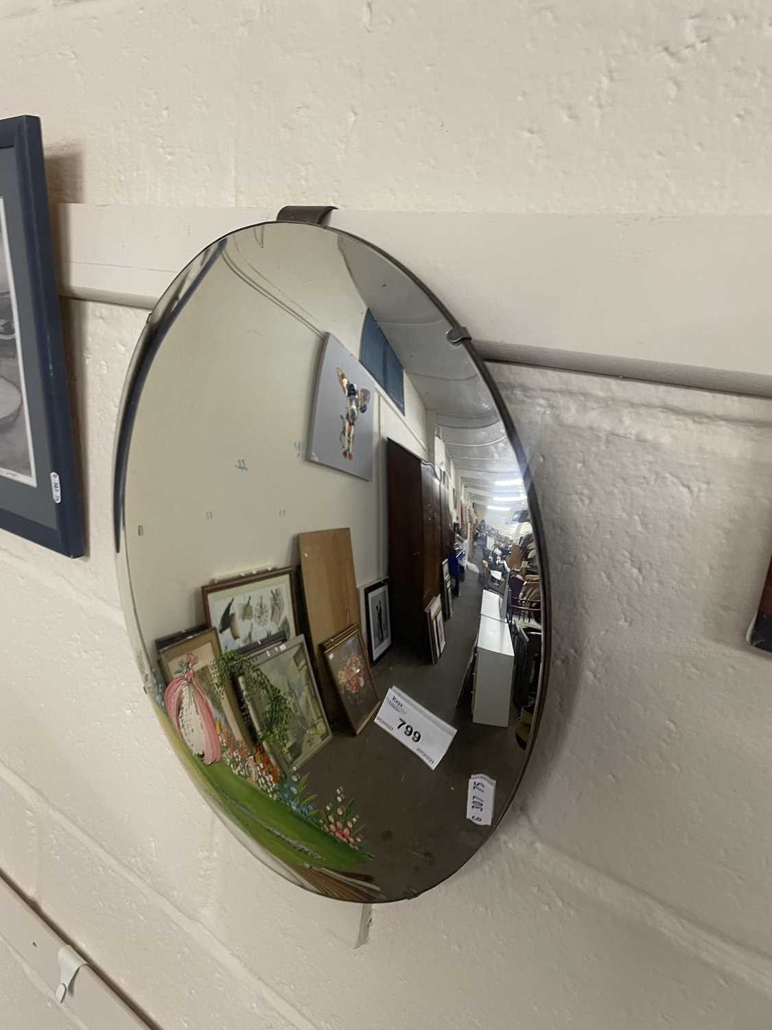 Circular convex wall mirror decorated with a lady