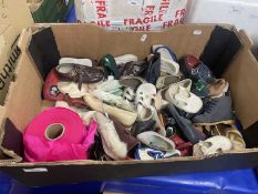 Box of various childrens shoes