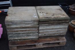 A pallet of paving slabs