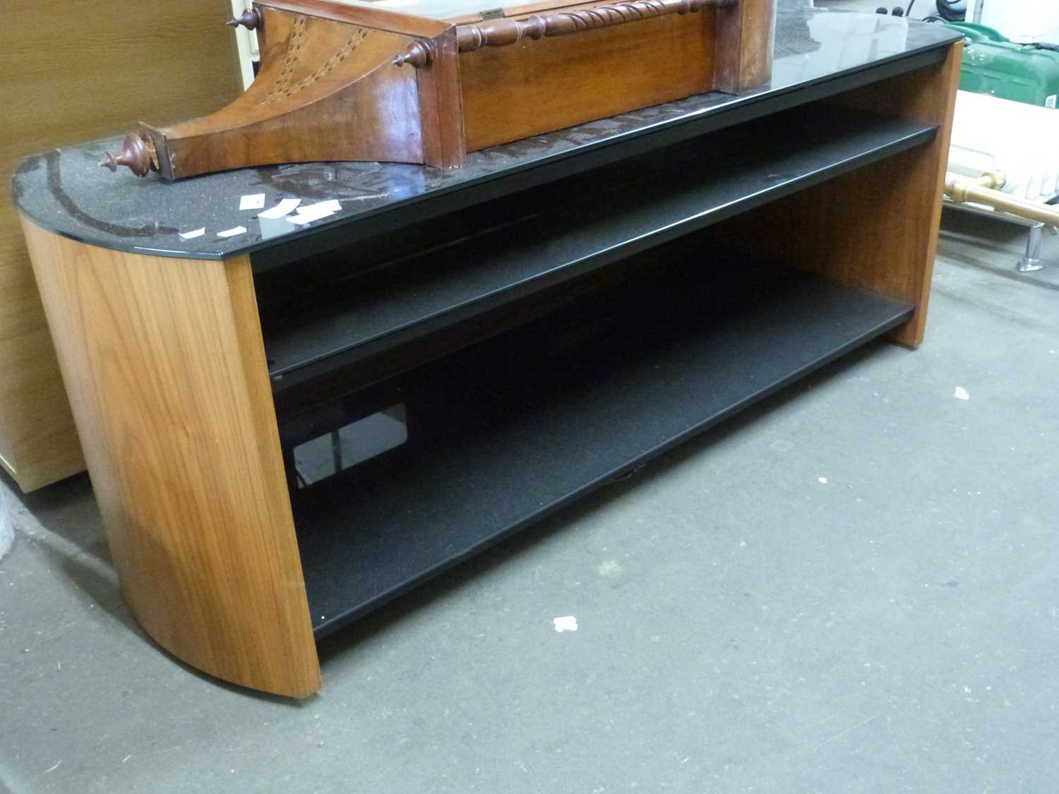 Black glass topped television stand
