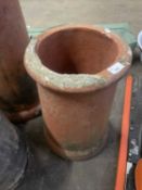 Squat cylindrical terracotta chimney pot