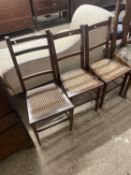 A pair of Edwardian cane seated bedroom chairs and one other (3)