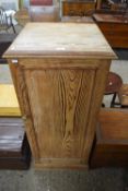 A early 20th Century pitch pine single door cupboard
