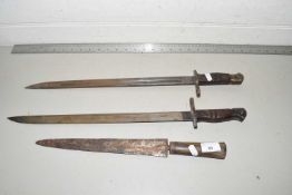 Mixed Lot: Two Remington rifle bayonets stamped US 1917 plus a further dagger (3)