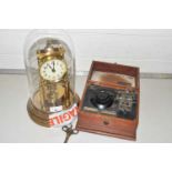 20th Century brass anniversary clock under a glass dome