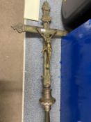 Large brass crucifix on pole