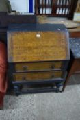 An early 20th Century oak and painted bureau