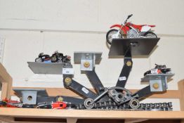 Hand made metal display stand and a collection of motorbike models