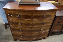 A Victorian mahogany bow front chest with two short and three long drawers raised on outswept