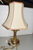 A modern brass mounted table lamp
