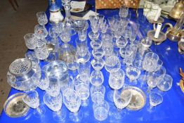Mixed Lot: Various crystal drinking glasses in a variety of designs, decanter, rose bowl, silver
