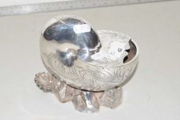 A shell formed silver plated spoon warmer
