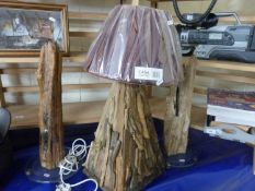 A driftwood mounted table lamp together with two driftwood ornaments (3)