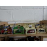 Collection of various boxed toy advertising vans and others