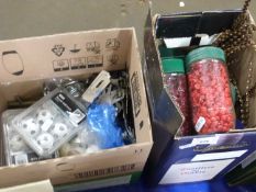 One box of various upholstery tacks together with a box of various door knobs and other assorted