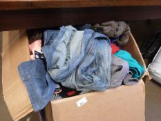 A box of assorted ladies, gents and childrens clothing