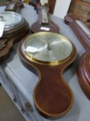 A reproduction mahogany barometer by Comitti of London