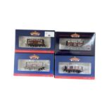 A mixed lot of four Bachmann Branch-Line Exclusive Collectors Club 00 gauge wagons, to include: -