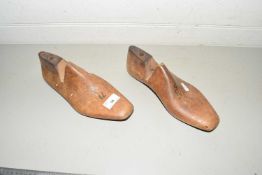 A pair of vintage shoe stretchers