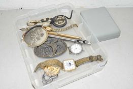 A box of various assorted wristwatches, belt buckles, pens etc