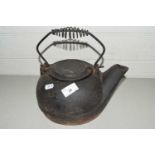 Cast iron teapot with looped handle