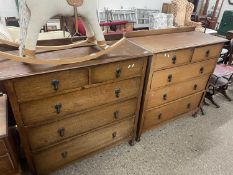 Pair of 20th Century oak five drawer chests with brass handles, 106cm wide