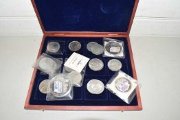 A case of various commemorative crowns and other British collectors coins
