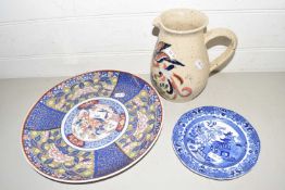 Mixed Lot: Modern Oriental wall plate, decorated jug and a Willow pattern dish