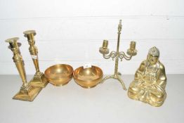 Mixed Lot: A brass Buddha model together with a pair of brass candlesticks, two heavy gauge brass