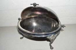 A silver plated serving dish with rollover lid