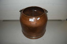 A heavy gauge copper small churn or bucket of circular form with looped swing handle