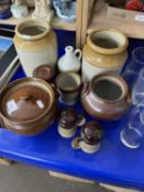 A quantity of mixed stone ware jugs and containers