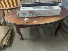 Reproduction oval coffee table on cabriole legs