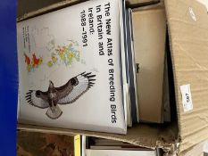 A box of books on natural history and others