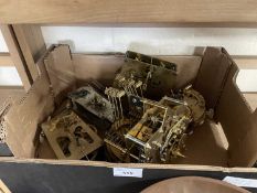 Box of assorted clock components and parts