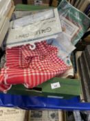 Box of assorted textiles to include needlepoint, lace and others