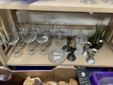 A group of assorted drinking glasses, two pairs of dwarf candlesticks etc