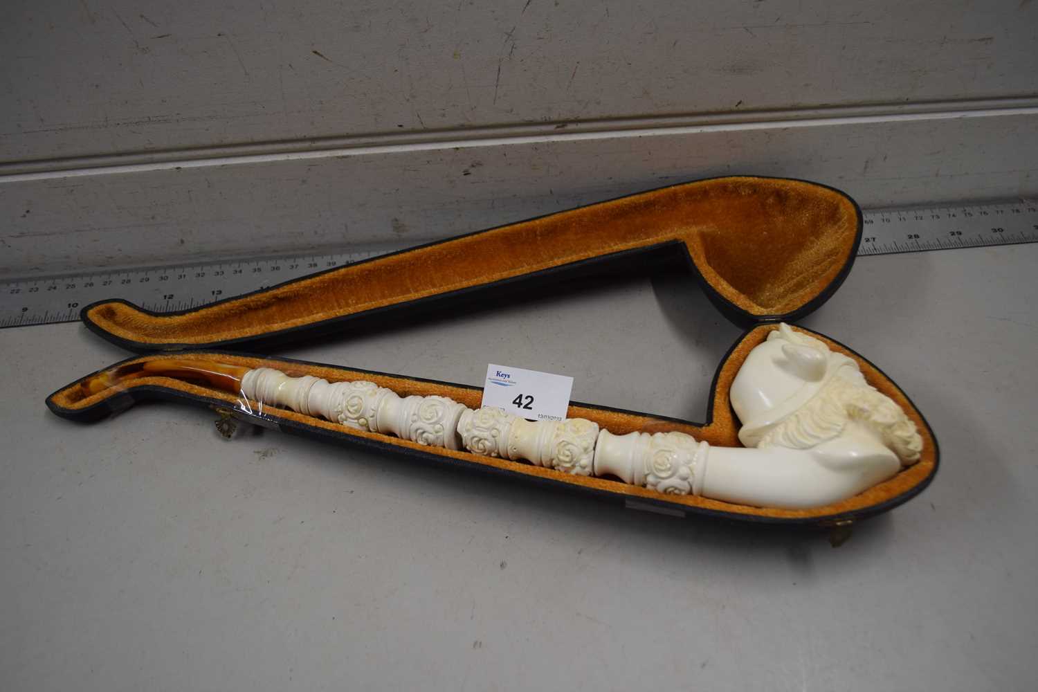 A large Meerschaum pipe with warrior head (some chips to stem)