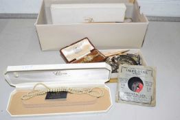 A box of various costume jewellery, wrist watches etc