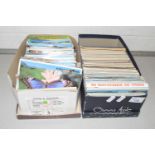 Two boxes of assorted postcards